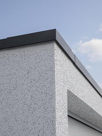 Dachranddesign als Schutz vor Fassadenverschmutzung